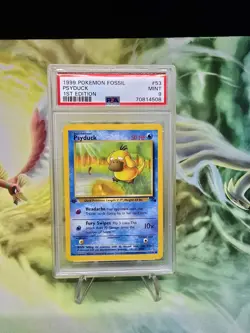 1999 POKEMON FOSSIL 1ST ED #53 PSYDUCK PSA 9 TCG MINT - Image 1