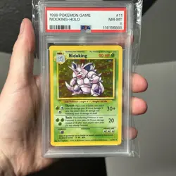 1999 POKEMON BASE SET UNLIMITED #11 NIDOKING-HOLO PSA 8 - Image 1