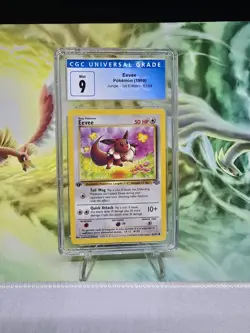Pokemon Eevee 1st Edition 51/64 CGC 9 1999 WOTC Jungle TCG - Image 1