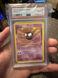 1999 Pokemon Fossil Gastly #33 Unlimited Non-Holo PSA 10 - Image 1