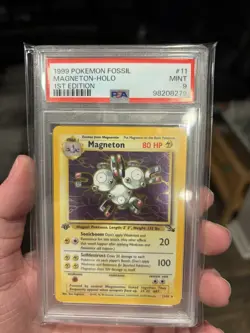1999 POKEMON FOSSIL 1ST ED #11 MAGNETON-HOLO PSA 9 - Image 1