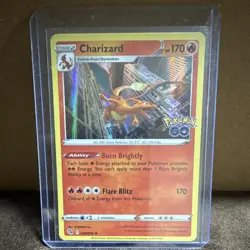 Pokemon Charizard 010/078 GO Holo Rare HP 170 Flare Blitz Burn Brightly TCG - Image 1