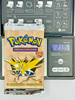 21.35 g HEAVY 1st Edition Fossil Zapdos Pokemon TCG Sealed Booster Pack - Image 1