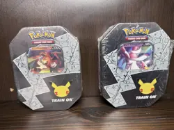 Pokemon 25th Anniversary Celebrations Tin Set: Lance's Charizard & Dark Sylveon - Image 1
