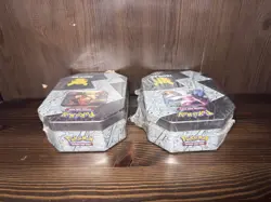 Pokemon 25th Anniversary Celebrations Tin Set: Lance's Charizard & Dark Sylveon - Image 3