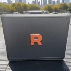 Team Rocket’s Glory Attache Case Pokemon Card Japanese Factory Sealed w/30 Packs - Image 1