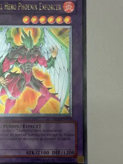 Elemental Hero Phoenix Enforcer (UTR) EOJ-EN032 Enemy of Justice 1st Edition #1 - Image 3