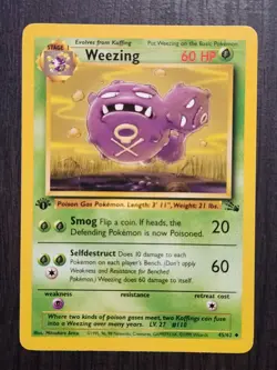 1st Edition Weezing Fossil Pokemon Card LP 45/62 Uncommon - Image 1
