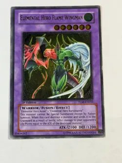 Yugioh Elemental Hero Flame Wingman TLM-EN035 Ultimate Rare 1st Edition UDE LP - Image 1