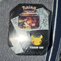 Pokemon TCG 25th Anniversary Celebrations Tin Lance’s Charizard V Sealed - Image 1