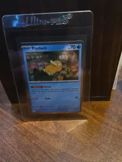 2025 Pokemon Mega Evolution Blister Pack Black Star Promo Cosmos Holo Psyduck #7 - Image 1