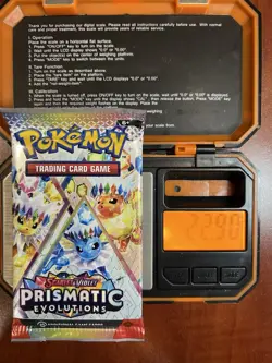 22.90g Prismatic Evolutions Pokemon Booster Pack New Sealed - Image 1