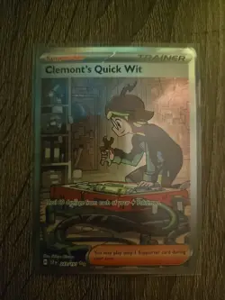 Pokemon TCG Clemont's Quick Wit Holo Card 243/191 Sv08: Surging Sparks - Image 1