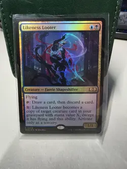 Likeness Looter Wilds of Eldraine Foil Mtg Near Mint - Image 1