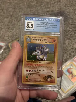 CGC 8.5 Brock's Rhydon Japanese Gym Heroes **SWIRL** 112 Holo Pokemon Card - Image 1