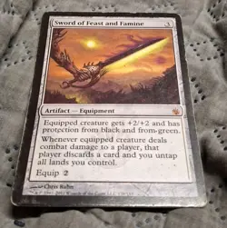 Sword of Feast and Famine Mirrodin Besieged Regular - Image 1