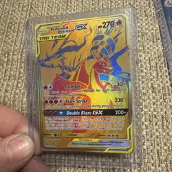Pokemon TCG Reshiram & Charizard GX SM247 Gold Black Star Promo NM Condition - Image 1