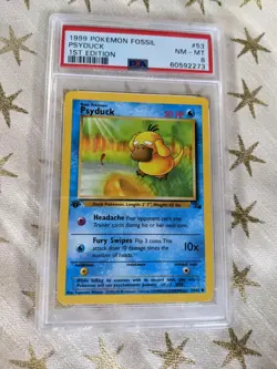 1999 Pokemon Fossil Psyduck 1st Edition 53/62 PSA NM-MT 8 - Image 1