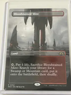 Bloodstained Mire (Borderless) Modern Horizons 3 Regular - Image 1