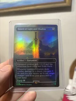 Sword of Light and Shadow (Borderless) Universes Beyond: Assassin's Creed Foil - Image 1