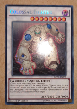 YUGIOH COLOSSAL FIGHTER SECRET RARE LC5D-EN030 1ST EDITION - Image 1