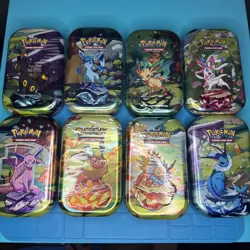Pokemon Prismatic Evolutions Complete Set of 8 Mini Tins Eeveelutions SEALED - Image 1