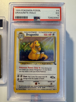 1999 POKEMON FOSSIL #4 DRAGONITE HOLO PSA 5 - Image 1