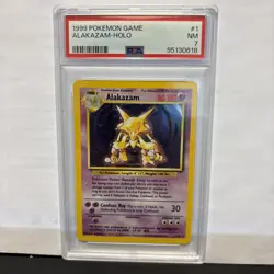 1999 POKEMON GAME ALAKAZAM HOLO PSA 7 - Image 1