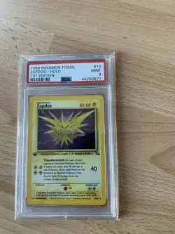 1st Edition Zapdos 15/62 PSA 9 Mint Rare Holo Pokemon Card Fossil - Image 1