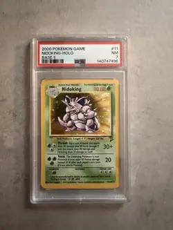 1999 POKEMON BASE SET UNLIMITED #11 NIDOKING-HOLO PSA 7 - Image 1
