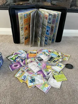 Large Bundle of Pokemon Cards with Binder Folder and Some Lose Cards - Image 1