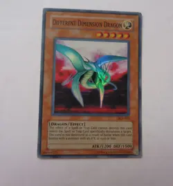 Different Dimension Dragon DCR-015 (Super Rare, Unlimited, Moderately Played MP) - Image 1
