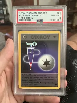 2000 Pokemon Rocket 1st Edition #81 Full Heal Energy PSA 8 NM - Image 1