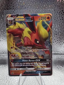Pokemon TCG Flareon GX Black Star Promo SM171 Holo Card NM Condition - Image 1