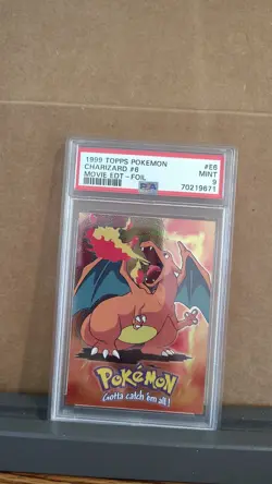 1999 Topps Pokemon The Movie Edt Charizard #6 Movie Edition-Foil PSA MINT 9 - Image 1