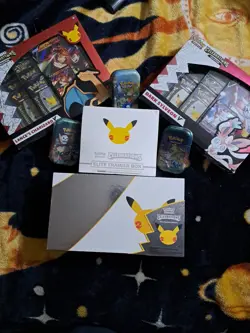 Pokemon TCG Celebrations Lot UPC, ETB, 3 TINS, CHARIZARD,SYLVEON Factory Sealed - Image 1