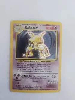 Pokemon TCG Alakazam Base Set 1/102 Holo 1999-2000 Wizards Base Set Copyright... - Image 1