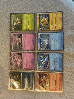 Pokemon Prismatic Evolutions Costco Mini Tin Cosmo Promos (8) Umbreon Sylveon - Image 1