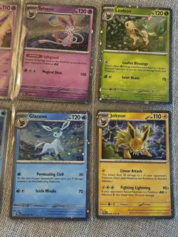 Pokemon Prismatic Evolutions Costco Mini Tin Cosmo Promos (8) Umbreon Sylveon - Image 2