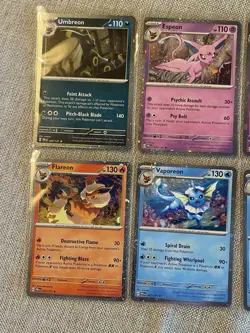 Pokemon Prismatic Evolutions Costco Mini Tin Cosmo Promos (8) Umbreon Sylveon - Image 3