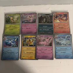 Pokemon Prismatic Evolutions Costco Mini Tin Cosmo Promos (8) Umbreon Sylveon - Image 1