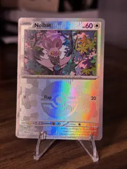 Noibat Poke Ball Pattern 090/131 Prismatic Evolutions Holo Pokemon Card TCG NM - Image 1
