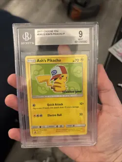 2017 Pokemon Ash’s Pikachu I Choose You! SM112 Black Star Promo - PSA 9 MINT - Image 1