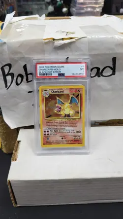 1999 CHARIZARD HOLO FOIL BLACK DOT ERROR BASE SET POKEMON TCG PSA 7 NM #4/102 - Image 1