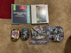 Pokemon Card Collection - Amount: 2 bags, 2 collector tins, and 2 binders full - Image 1