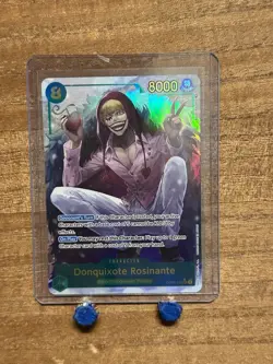 One Piece TCG Donquixote Rosinante Alt Art SEC OP04-119 Kingdoms of Conspiracies - Image 1