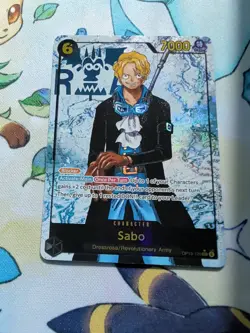 One Piece Sabo OP13-120 SEC Parallel ENGLISH Carrying On His Will in hand - Image 1