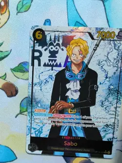 One Piece Sabo OP13-120 SEC Parallel ENGLISH Carrying On His Will in hand - Image 3