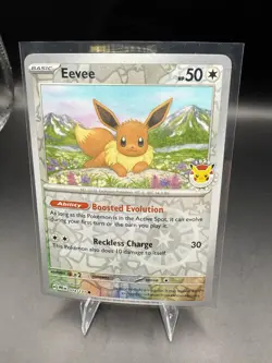Eevee - (Pokemon Day 2025) (Reverse Cosmos Holo) 074/131 - Image 1