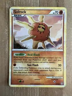 Solrock - 9/102 - Holo Rare Triumphant HGSS Set TCG - Pokemon Card - DMG - Image 1